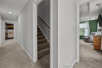 Stunning and spacious four-bedroom home with a versatile bonus on Anderson Creek Golf Club in North Carolina - for sale on GolfHomes.com, golf home, golf lot
