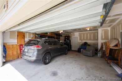 Stunning and spacious four-bedroom home with a versatile bonus on Anderson Creek Golf Club in North Carolina - for sale on GolfHomes.com, golf home, golf lot