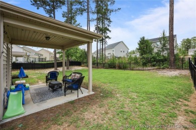Stunning and spacious four-bedroom home with a versatile bonus on Anderson Creek Golf Club in North Carolina - for sale on GolfHomes.com, golf home, golf lot
