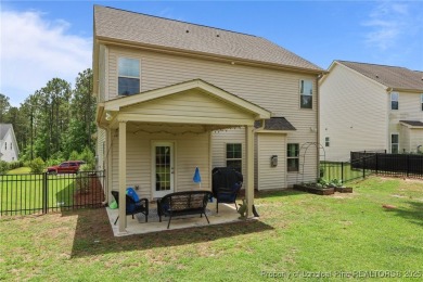 Stunning and spacious four-bedroom home with a versatile bonus on Anderson Creek Golf Club in North Carolina - for sale on GolfHomes.com, golf home, golf lot
