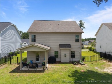 Stunning and spacious four-bedroom home with a versatile bonus on Anderson Creek Golf Club in North Carolina - for sale on GolfHomes.com, golf home, golf lot
