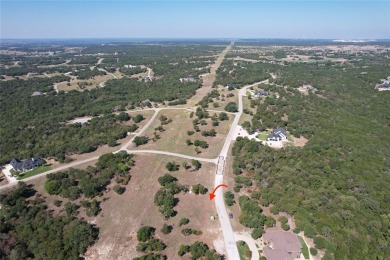 Escape to the tranquility of this enchanting half-acre woodland on The Retreat in Texas - for sale on GolfHomes.com, golf home, golf lot