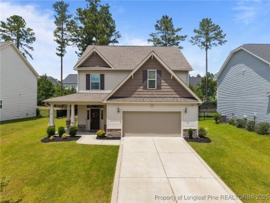 Stunning and spacious four-bedroom home with a versatile bonus on Anderson Creek Golf Club in North Carolina - for sale on GolfHomes.com, golf home, golf lot