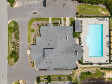 Stunning and spacious four-bedroom home with a versatile bonus on Anderson Creek Golf Club in North Carolina - for sale on GolfHomes.com, golf home, golf lot