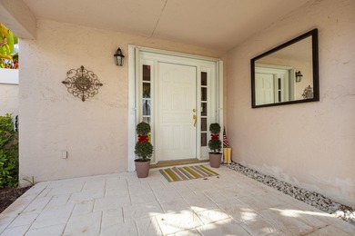 Immaculate golf course home in the prestigious Barclay Club at on PGA National Golf Club in Florida - for sale on GolfHomes.com, golf home, golf lot