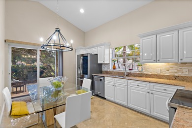 Immaculate golf course home in the prestigious Barclay Club at on PGA National Golf Club in Florida - for sale on GolfHomes.com, golf home, golf lot