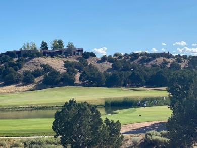 Lake, fairway and green, with panoramic sunrise and sunset views on The Club At Las Campanas  in New Mexico - for sale on GolfHomes.com, golf home, golf lot