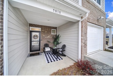 Like a model home, this beautifully maintained townhome invites on Tega Cay Golf Club in South Carolina - for sale on GolfHomes.com, golf home, golf lot