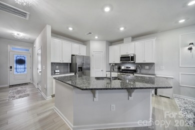 Like a model home, this beautifully maintained townhome invites on Tega Cay Golf Club in South Carolina - for sale on GolfHomes.com, golf home, golf lot
