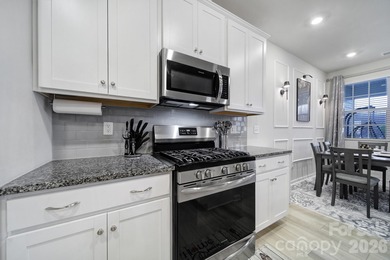 Like a model home, this beautifully maintained townhome invites on Tega Cay Golf Club in South Carolina - for sale on GolfHomes.com, golf home, golf lot