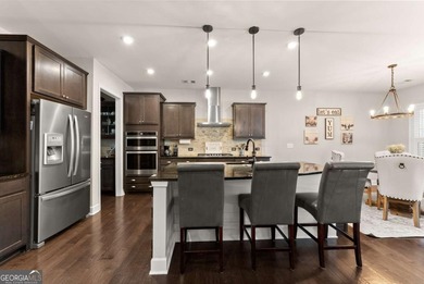 Welcome home! This 4 bedroom, 2.5 bath home on a GOLF COURSE LOT on Reunion Golf Club in Georgia - for sale on GolfHomes.com, golf home, golf lot