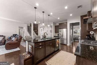 Welcome home! This 4 bedroom, 2.5 bath home on a GOLF COURSE LOT on Reunion Golf Club in Georgia - for sale on GolfHomes.com, golf home, golf lot