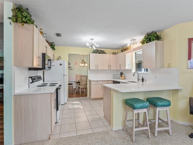 Fantastic Location!  Exceptional home situated on a Wildlife on El Diablo Executive Golf Course in Florida - for sale on GolfHomes.com, golf home, golf lot