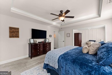 Welcome home! This 4 bedroom, 2.5 bath home on a GOLF COURSE LOT on Reunion Golf Club in Georgia - for sale on GolfHomes.com, golf home, golf lot