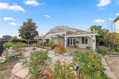 Nestled in the heart of Murrieta, this charming single-story on The Golf Club At Rancho California in California - for sale on GolfHomes.com, golf home, golf lot