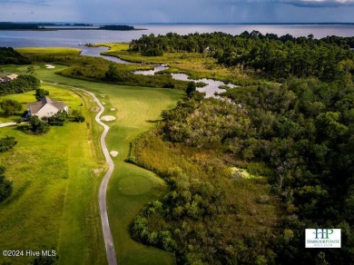 Waterfront resort home with stunning waterfront views! Dock your on Harbour Point Golf Club in North Carolina - for sale on GolfHomes.com, golf home, golf lot