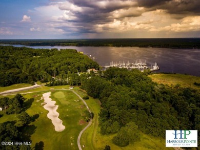 Waterfront resort home with stunning waterfront views! Dock your on Harbour Point Golf Club in North Carolina - for sale on GolfHomes.com, golf home, golf lot