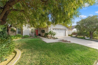 Nestled in the heart of Murrieta, this charming single-story on The Golf Club At Rancho California in California - for sale on GolfHomes.com, golf home, golf lot