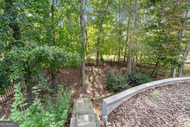 Welcome home! This 4 bedroom, 2.5 bath home on a GOLF COURSE LOT on Reunion Golf Club in Georgia - for sale on GolfHomes.com, golf home, golf lot