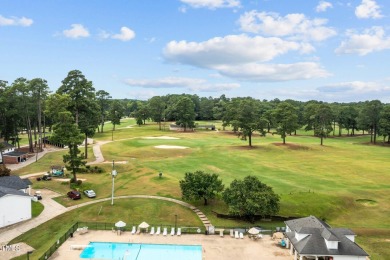Experience breathtaking sunrises and enchanting views from every on Country Club of Johnston County in North Carolina - for sale on GolfHomes.com, golf home, golf lot