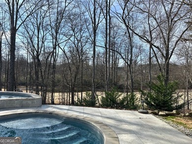 Welcome home! This 4 bedroom, 2.5 bath home on a GOLF COURSE LOT on Reunion Golf Club in Georgia - for sale on GolfHomes.com, golf home, golf lot