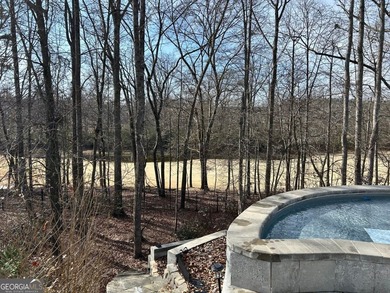 Welcome home! This 4 bedroom, 2.5 bath home on a GOLF COURSE LOT on Reunion Golf Club in Georgia - for sale on GolfHomes.com, golf home, golf lot