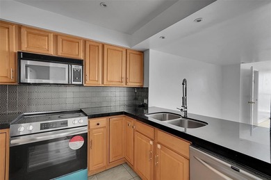 Stunning Condo with Panoramic Views! All current assessments on  in Florida - for sale on GolfHomes.com, golf home, golf lot