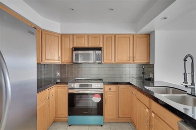 Stunning Condo with Panoramic Views! All current assessments on  in Florida - for sale on GolfHomes.com, golf home, golf lot