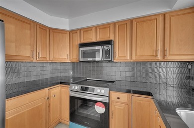 Stunning Condo with Panoramic Views! All current assessments on  in Florida - for sale on GolfHomes.com, golf home, golf lot