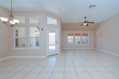 Welcome to this charming patio-style home! As you come inside on Rockport Country Club in Texas - for sale on GolfHomes.com, golf home, golf lot