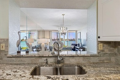 Welcome to your coastal retreat in beautiful Isla del Sol. This on Isla Del Sol Yacht and Country Club in Florida - for sale on GolfHomes.com, golf home, golf lot