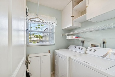 Welcome to your coastal retreat in beautiful Isla del Sol. This on Isla Del Sol Yacht and Country Club in Florida - for sale on GolfHomes.com, golf home, golf lot