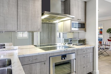 Completely renovated and spacious 2BR/2.5BA corner unit in the on Everglades Club in Florida - for sale on GolfHomes.com, golf home, golf lot