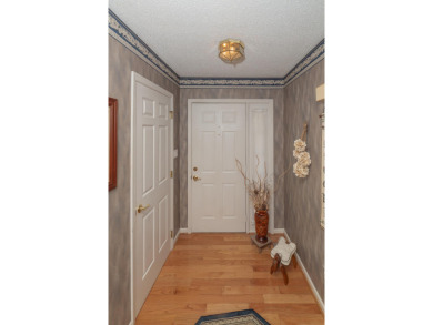 Beautiful home nestled among mature trees giving just enough on Emory Golf and Country Club in Tennessee - for sale on GolfHomes.com, golf home, golf lot