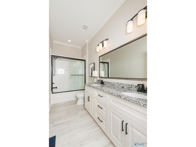 Step into this exceptional residence nestled in the coveted Cog on Canebrake Golf Club in Alabama - for sale on GolfHomes.com, golf home, golf lot