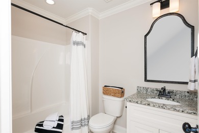 Step into this exceptional residence nestled in the coveted Cog on Canebrake Golf Club in Alabama - for sale on GolfHomes.com, golf home, golf lot