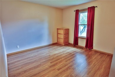 A rare find, high quality spacious, one level living, without an on New Richmond Golf Club in Wisconsin - for sale on GolfHomes.com, golf home, golf lot