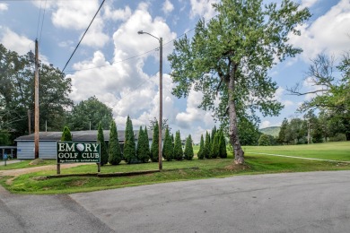 Beautiful home nestled among mature trees giving just enough on Emory Golf and Country Club in Tennessee - for sale on GolfHomes.com, golf home, golf lot