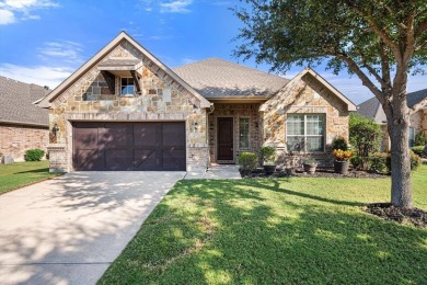 Discover the perfect blend of comfort and style in this move in on Mansfield National Golf Club in Texas - for sale on GolfHomes.com, golf home, golf lot