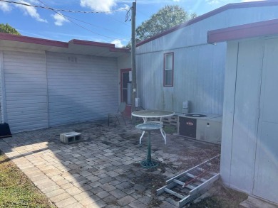 DOUBLE WIDE 2-BEDROOM, 2-BATHROOM HOME WITH AFFORDABLE LOT RENT! on YMCA Par 3 Home of the First Tee of Lakeland in Florida - for sale on GolfHomes.com, golf home, golf lot