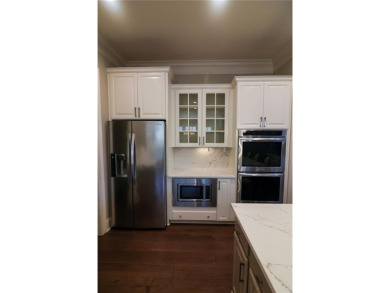 This fully updated, absolutely stunning home in this on Woodmont Golf and Country Club in Georgia - for sale on GolfHomes.com, golf home, golf lot