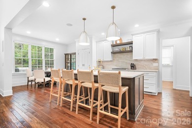 Beautifully updated and impeccably maintained, this custom brick on Cowans Ford Country Club in North Carolina - for sale on GolfHomes.com, golf home, golf lot