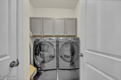 A beautifully upgraded residence in Waterford of the Carolinas on Magnolia Greens Golf Plantation in North Carolina - for sale on GolfHomes.com, golf home, golf lot