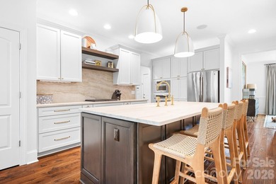 Beautifully updated and impeccably maintained, this custom brick on Cowans Ford Country Club in North Carolina - for sale on GolfHomes.com, golf home, golf lot