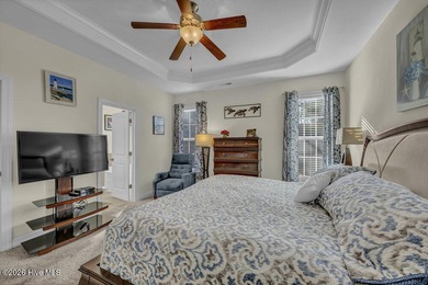 A beautifully upgraded residence in Waterford of the Carolinas on Magnolia Greens Golf Plantation in North Carolina - for sale on GolfHomes.com, golf home, golf lot