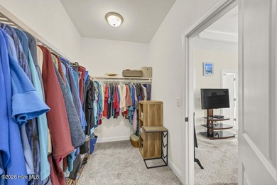 A beautifully upgraded residence in Waterford of the Carolinas on Magnolia Greens Golf Plantation in North Carolina - for sale on GolfHomes.com, golf home, golf lot