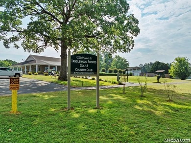 Build your dream home on this beautiful wooded lot located in a on Tanglewood Shores Golf Club in Virginia - for sale on GolfHomes.com, golf home, golf lot