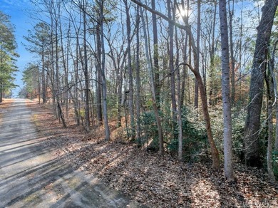 Build your dream home on this beautiful wooded lot located in a on Tanglewood Shores Golf Club in Virginia - for sale on GolfHomes.com, golf home, golf lot