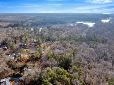 Build your dream home on this beautiful wooded lot located in a on Tanglewood Shores Golf Club in Virginia - for sale on GolfHomes.com, golf home, golf lot
