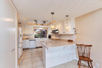 Enjoy desert living at its finest in this comfortable condo with on Chaparral Country Club in California - for sale on GolfHomes.com, golf home, golf lot